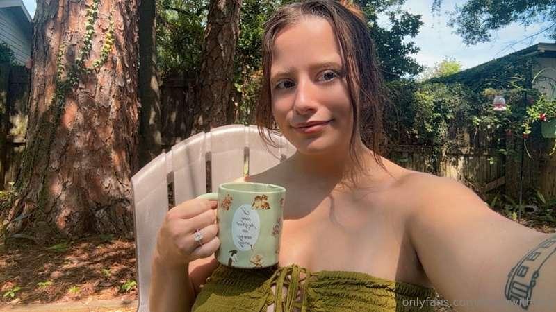 Topless in the back yard having coffee. ☀️ 