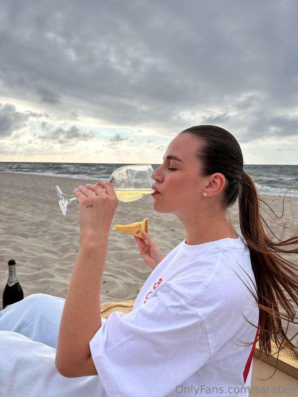 Wine and cheese by the sea on a warm and atmospheric evening..