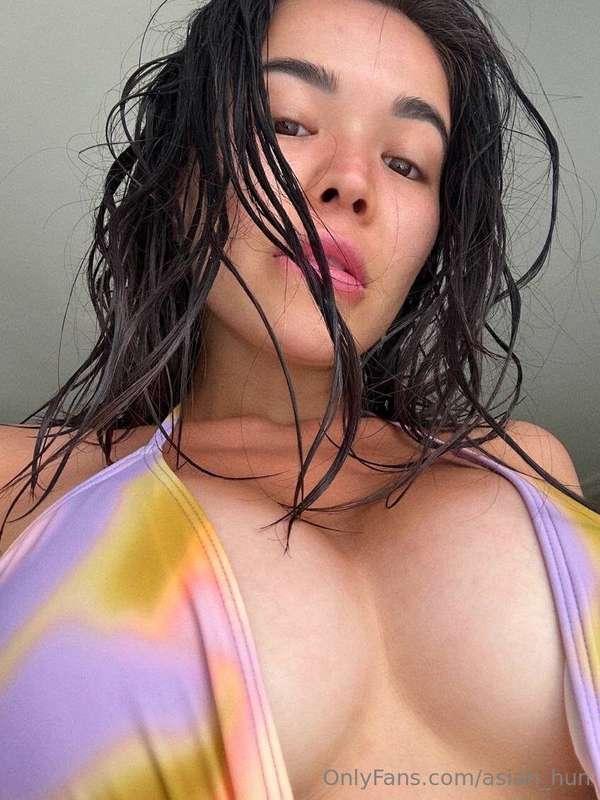 In a swimsuit and under the blazing sun - ready to refresh y..