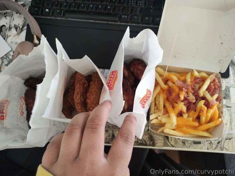20 wings, cheese and bacon fries, 4 chicken strips, like 1/4..