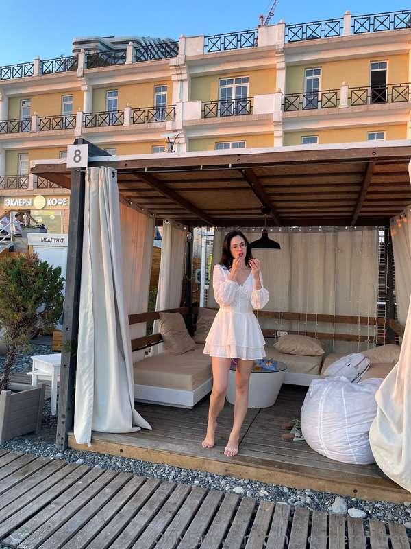 Embracing the summer vibes in my favorite white dress, explo..