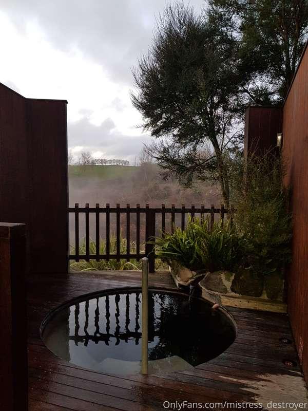 The outdoor geothermal hot tub after we defiled it 😅 (note a..