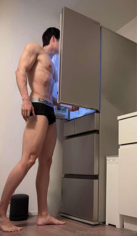 This is the pose of looking into the refrigerator.
