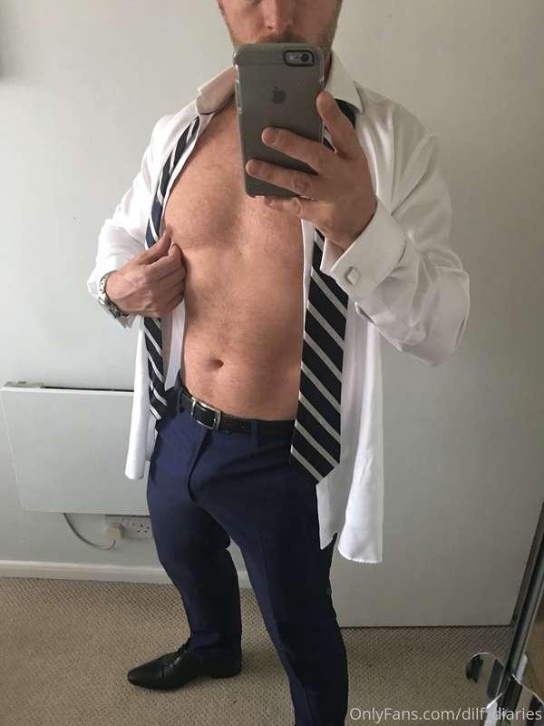 Nipple tease = suit bulge
