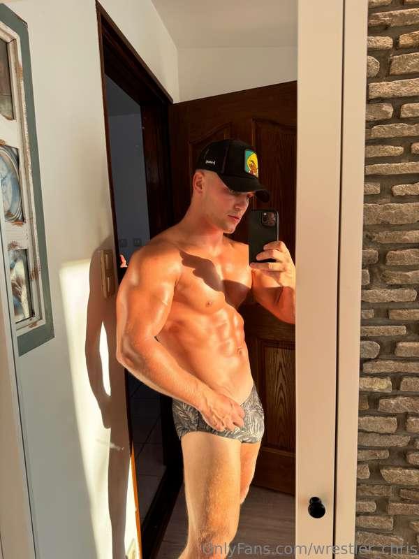 Mirror shot, sun kissing the skin, boxer briefs hugging this..
