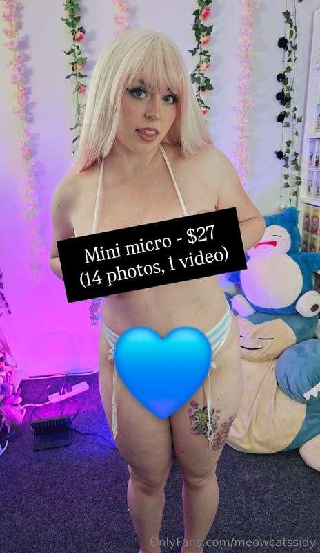 I'm wearing the tiniest bikini EVER.My boobs arespilling out..