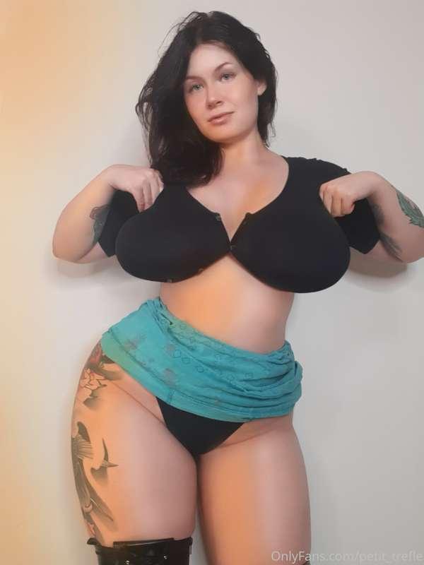 Tucking my shirt under my boobs :P I do this randomly around..