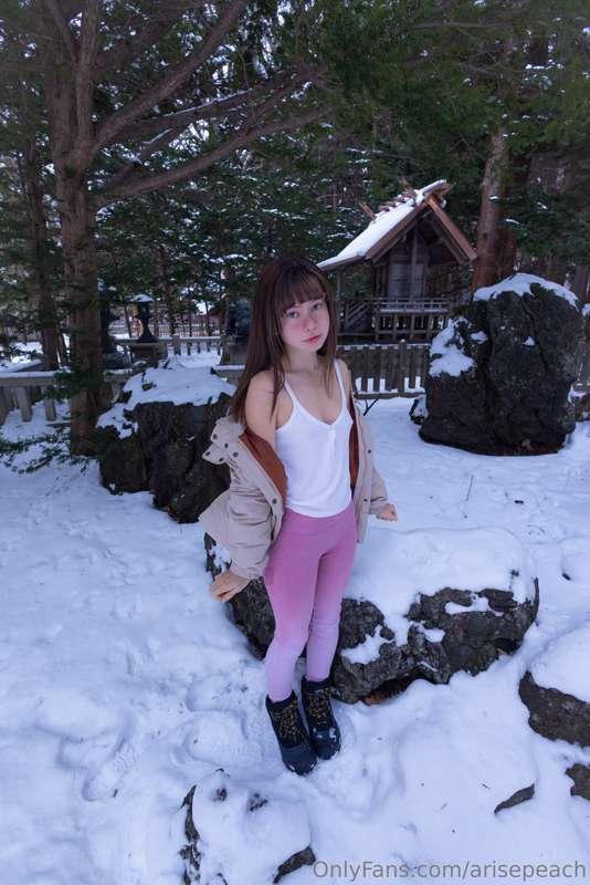 Cozy girlfriend is calling you to play in the snow