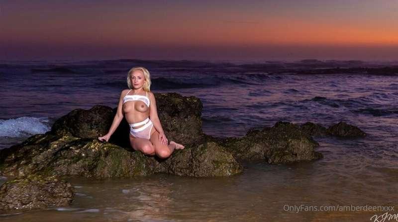 Just me chilling topless on a rock
