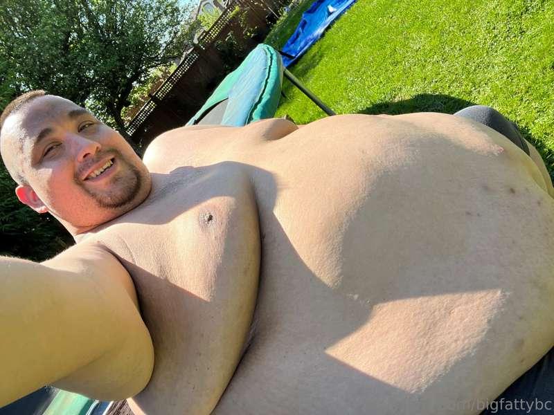 Getting a tan! While waiting for the pool to fill.