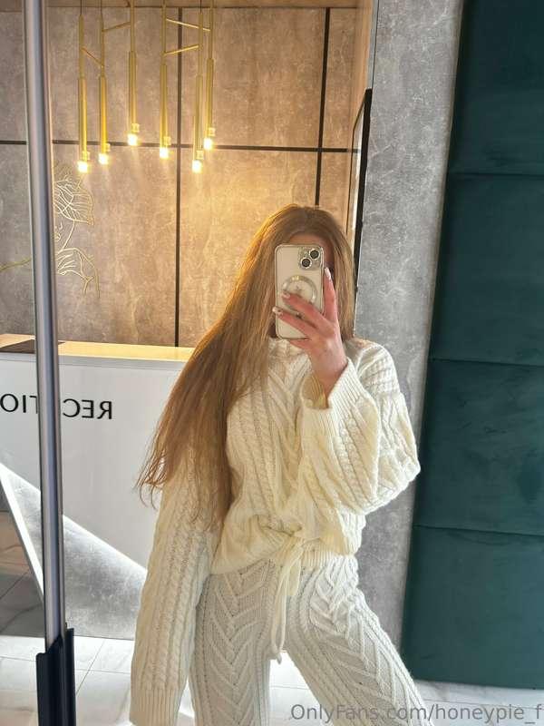 Draped in the warmth of my favorite hand-knit ensemble, embr..
