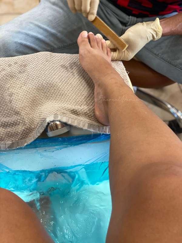 He’s so lucky getting to rub and scrub my pretty feet