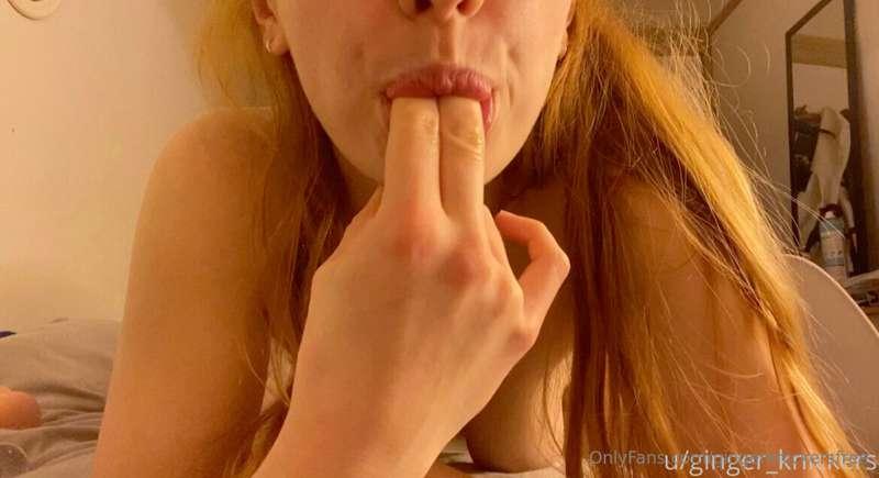 Just a hot girl sucking and tasting her fingers seductively,..