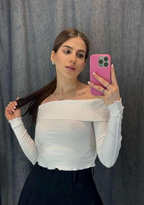 The white sweater is one of the classic closet items that ha..