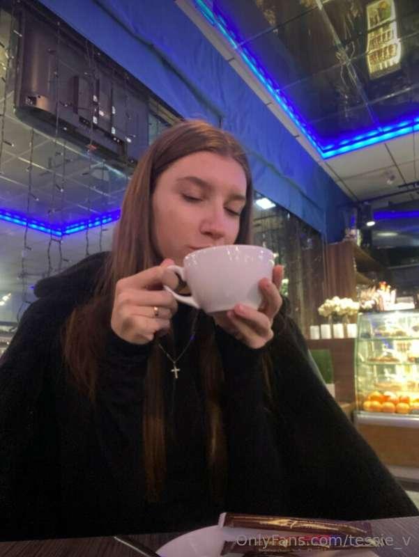 In the heart of a cozy cafe, where the aroma of freshly grou..