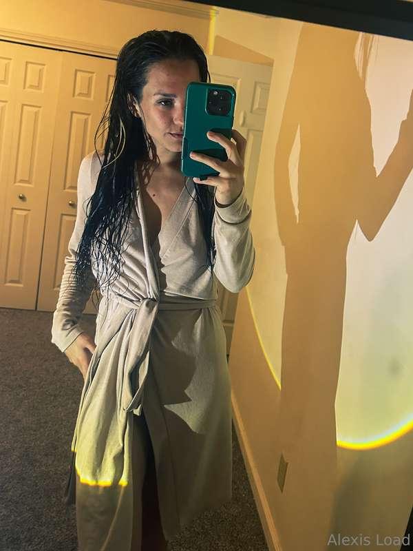 Fresh from the shower, wrapped in a robe, and feeling way to..