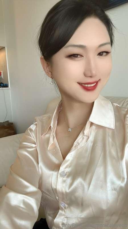 Madame Monica In Champagne Satin Shirt At Indoor