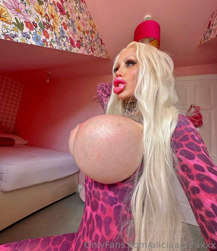 Enjoy this up close personal video of my huge fake boobs & b..