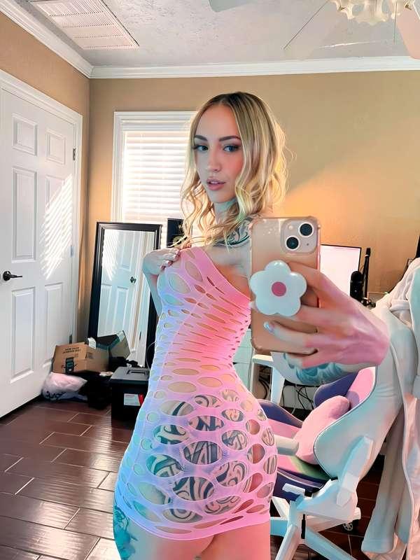 This pink fishnet dress is barely holding me in 😈 Think you ..