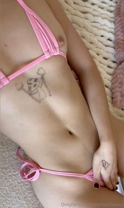 Chillin’ in my pink bikini, covering just enough... Waiting ..