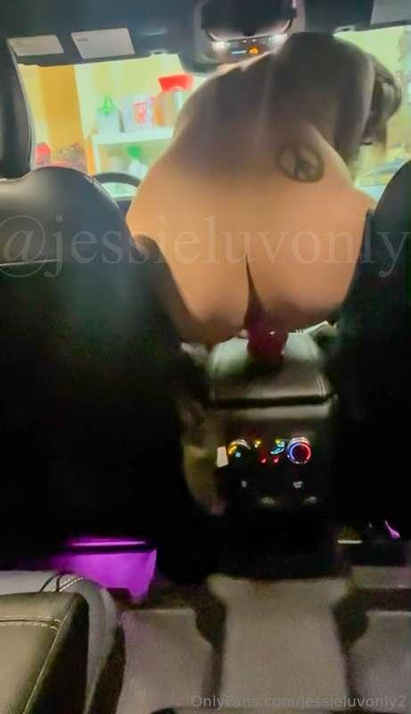 Watch me ride a dildo on my center console and then finish m..