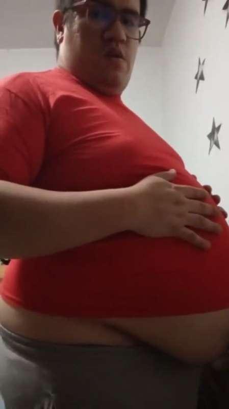 MIKE, SHOWING OFF HIS BELLY