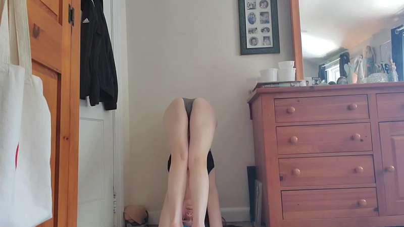 Lotus headstand against the wall 