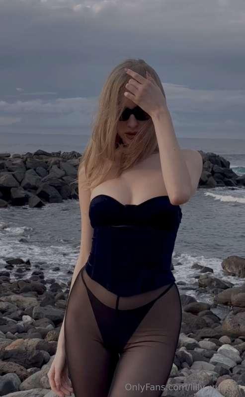 Against the backdrop of the endless blue sea, enveloped in l..