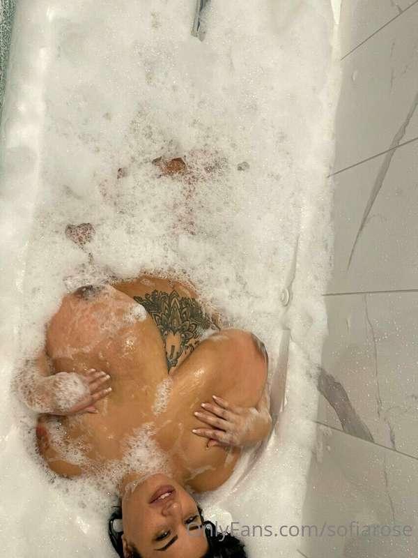 The water may be warm, but these tits are even hotter. 🥵