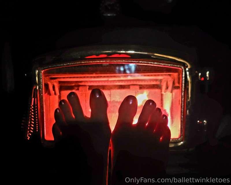 Keeping my toes warm in front of the fire 👣🔥