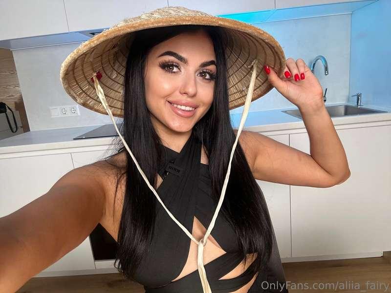 Took a photo wearing a Chinese hat in my home. The ribbon of..