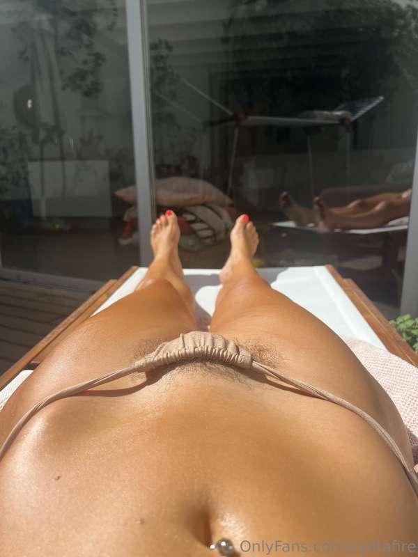 Today I sunbathed for an hour on my terrace to top up my tan..