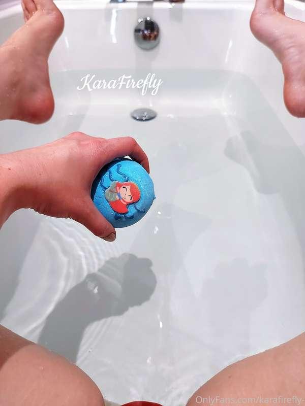 Dropping in the bath bomb <3 such a beautiful blue <3 a litt..