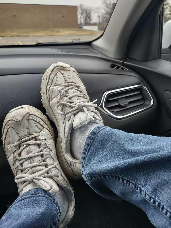 Taking off my shoes and socks before getting busy in the par..