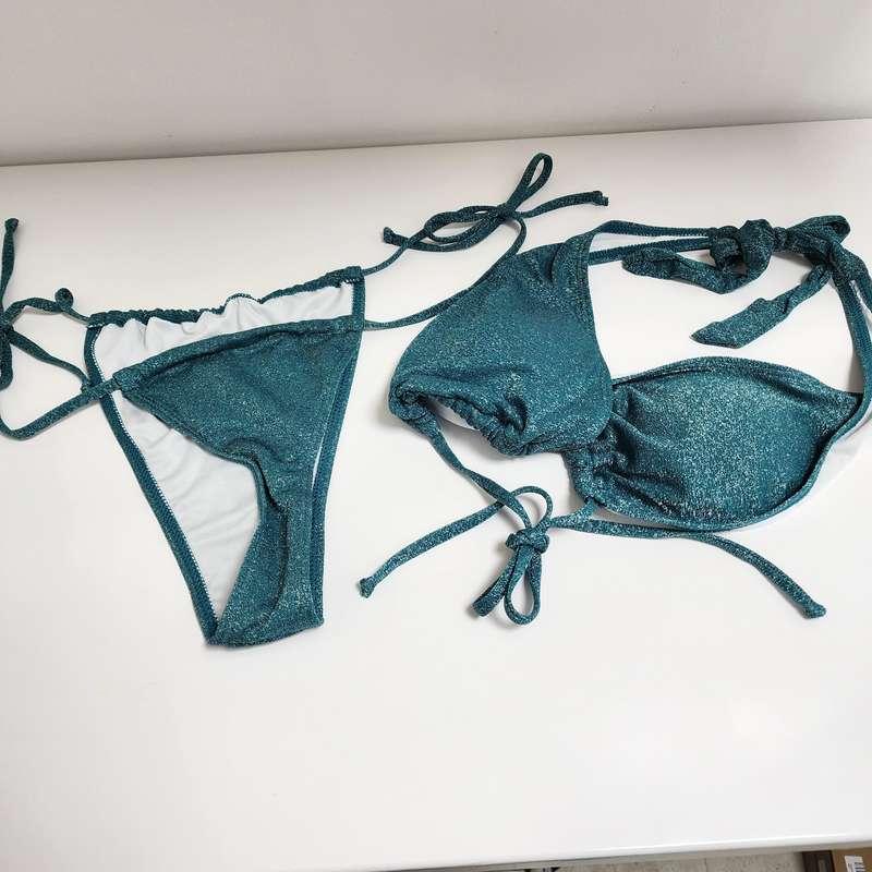 Unlock to see what this new string thong bikini looks like o..