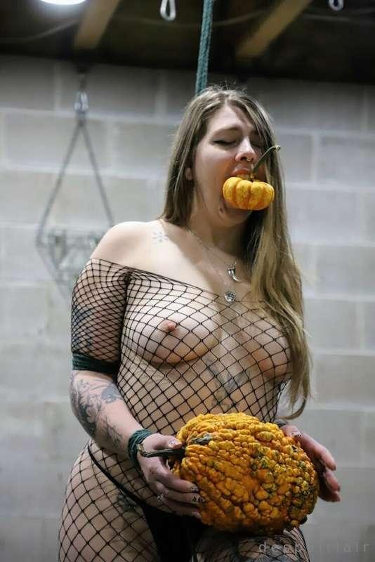 Pumpkin gag, balancing on a pumpkin, and holding a pumpkin w..