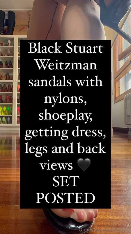 Black Stuart Weitzman sandals with nylons, shoeplay, getting..