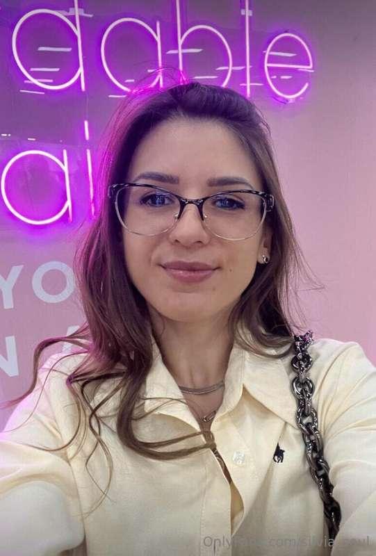 Leaves dance in the wind behind the glass, and I enjoy the p..