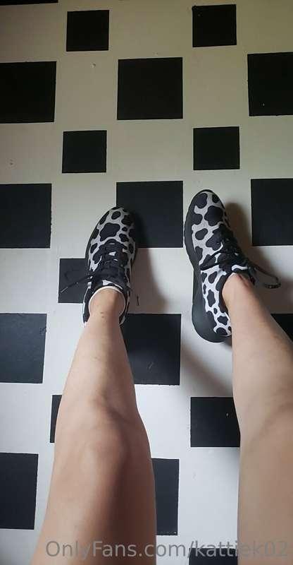 No face. Just removing my cow print sneakers and then my soc..