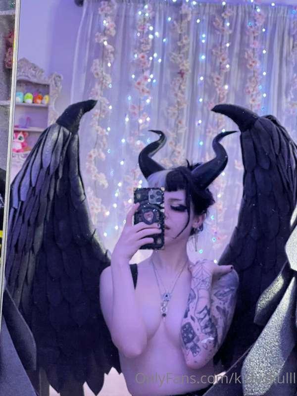 Made some tiktoks for you while wearing these wings and noth..