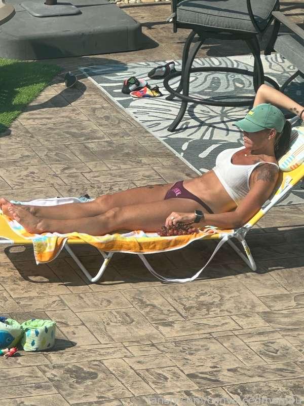 Ok this was not planned. Hubby took random pics from the bedroom window before coming outside himself…as I was taking a couple pics myself outside 😂🤭🤪 #candid #pool #tanning #milf