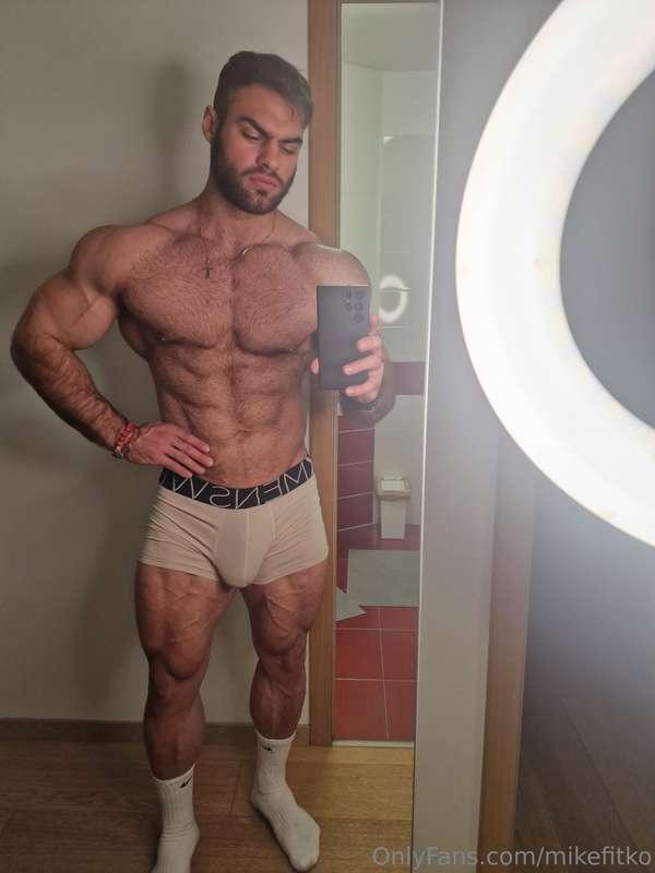 Flashing the ring light on my abs, boxer stretched by my fat..