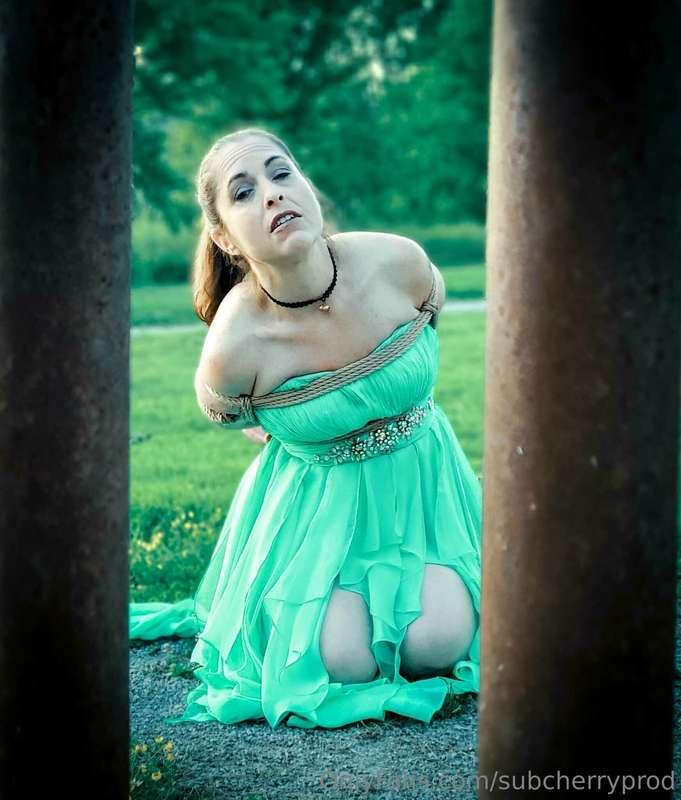 Tied up outside in a fancy dress... not a bad way to spend t..