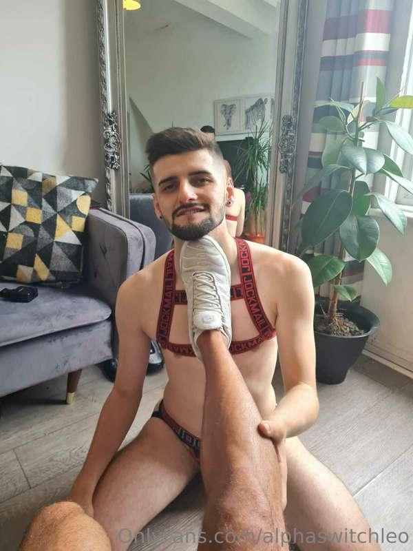 Worshipping @brutalmaster  dirty trainers like a good boy 😈
