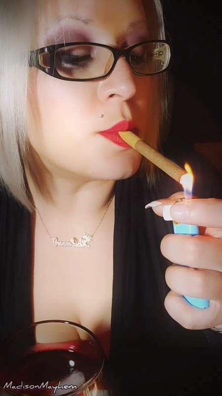 Having wine, smoking cigars and watching the MMA fight tonig..