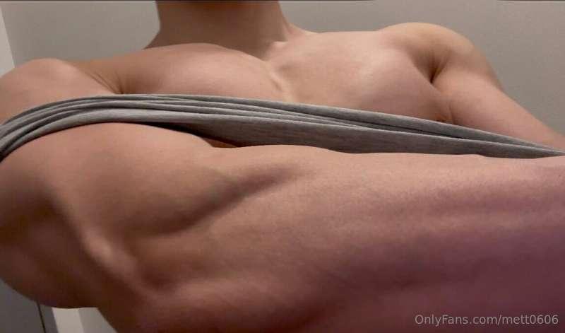 A tank top being removed.