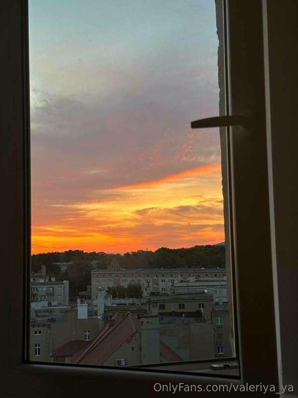 Two people were looking out one window. One saw rain and dir..