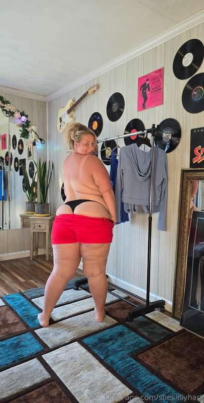 See how that thong comes out of the shorts and rides across ..