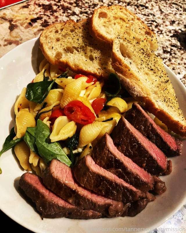 Oil pasta with bocconcini, fresh basil, salted tomatoes, sou..