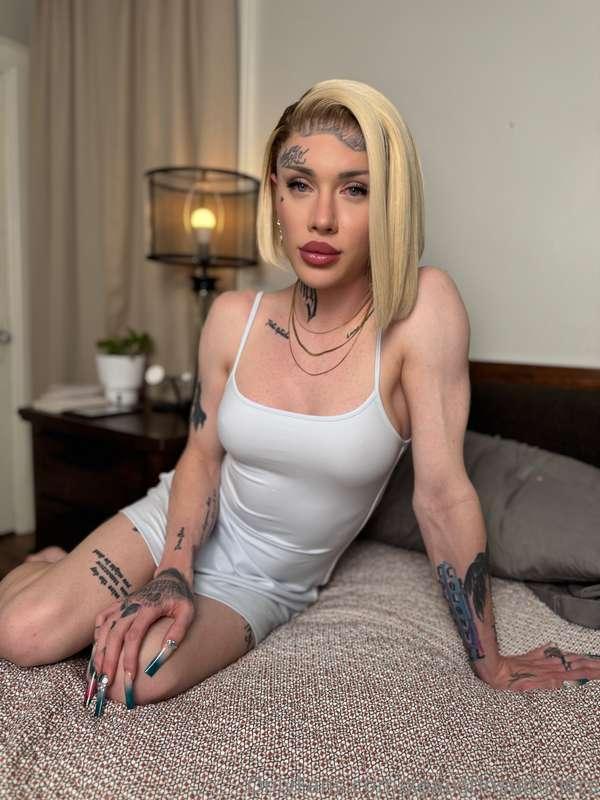 Short hair, soft sheets, and a dress that makes it simple fo..